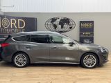 Ford Focus Turnier bei Gebrauchtwagen.expert - Abbildung (8 / 10) Ford Focus Turnier bei Gebrauchtwagen.expert - Abbildung (8 / 10)